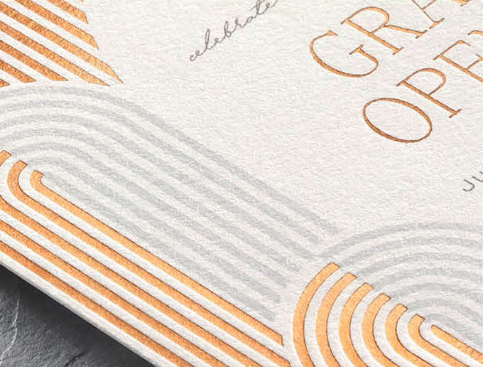 Foil Stamping Closeup image of a contemporary arch design in copper foil stamping on a custom invitation