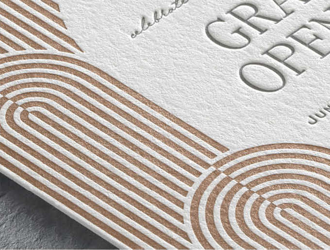 Letterpress Printing Closeup image of a contemporary arch design in copper and gray letterpress on a custom invite